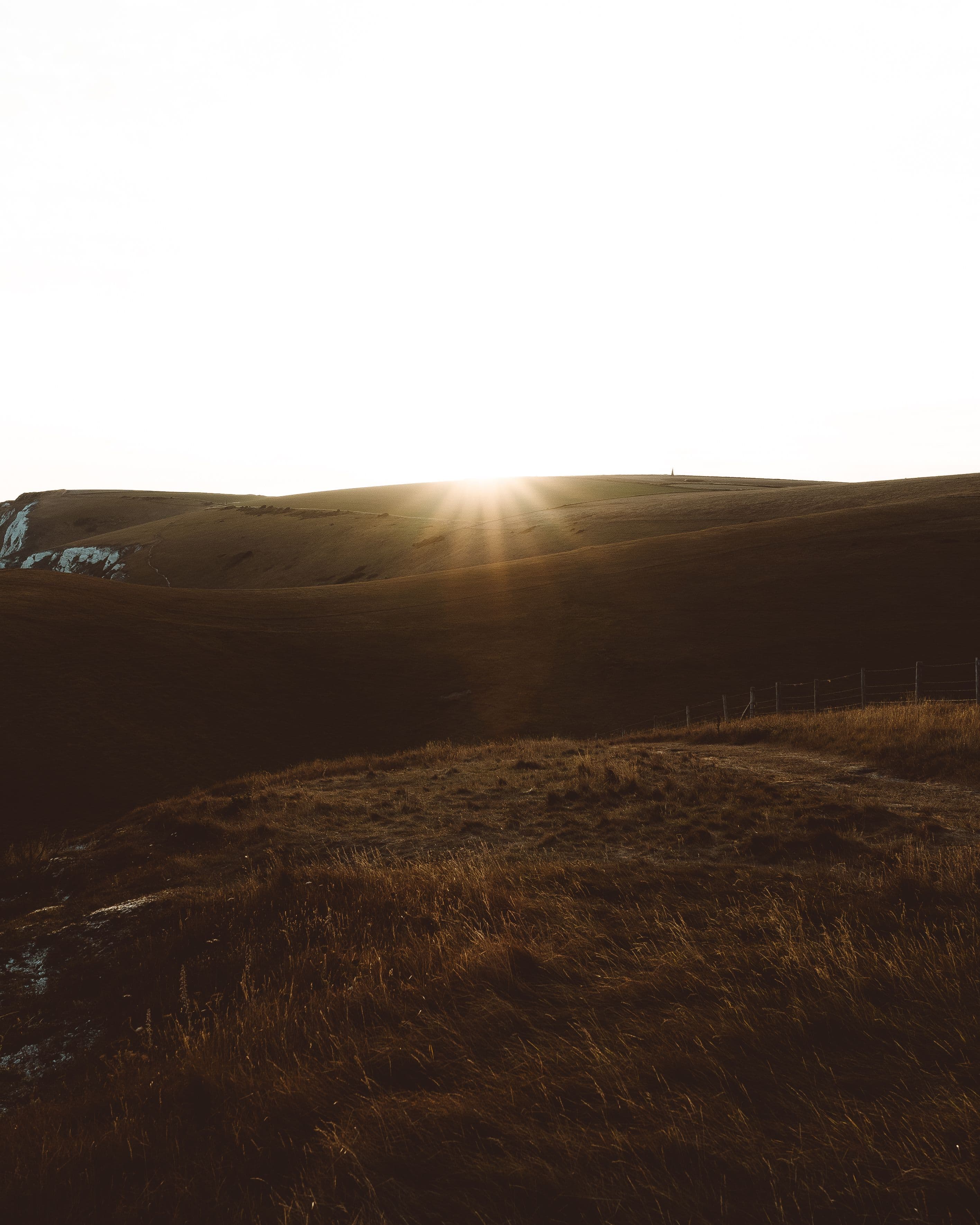 Sunrise over misty mountains, evoking the Atwea Mountains retreat setting